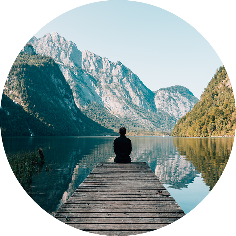 person looking at calm landscape