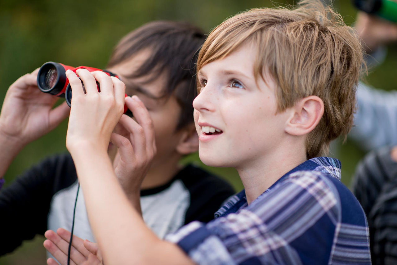 kids-binoculars-hands-outside.jpg